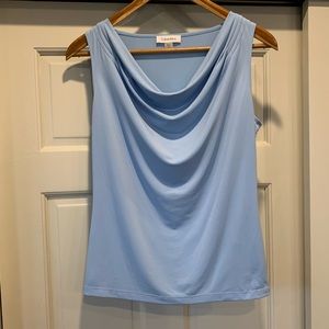 Calvin Klein polyester top, soft material. Super cute. Size:M